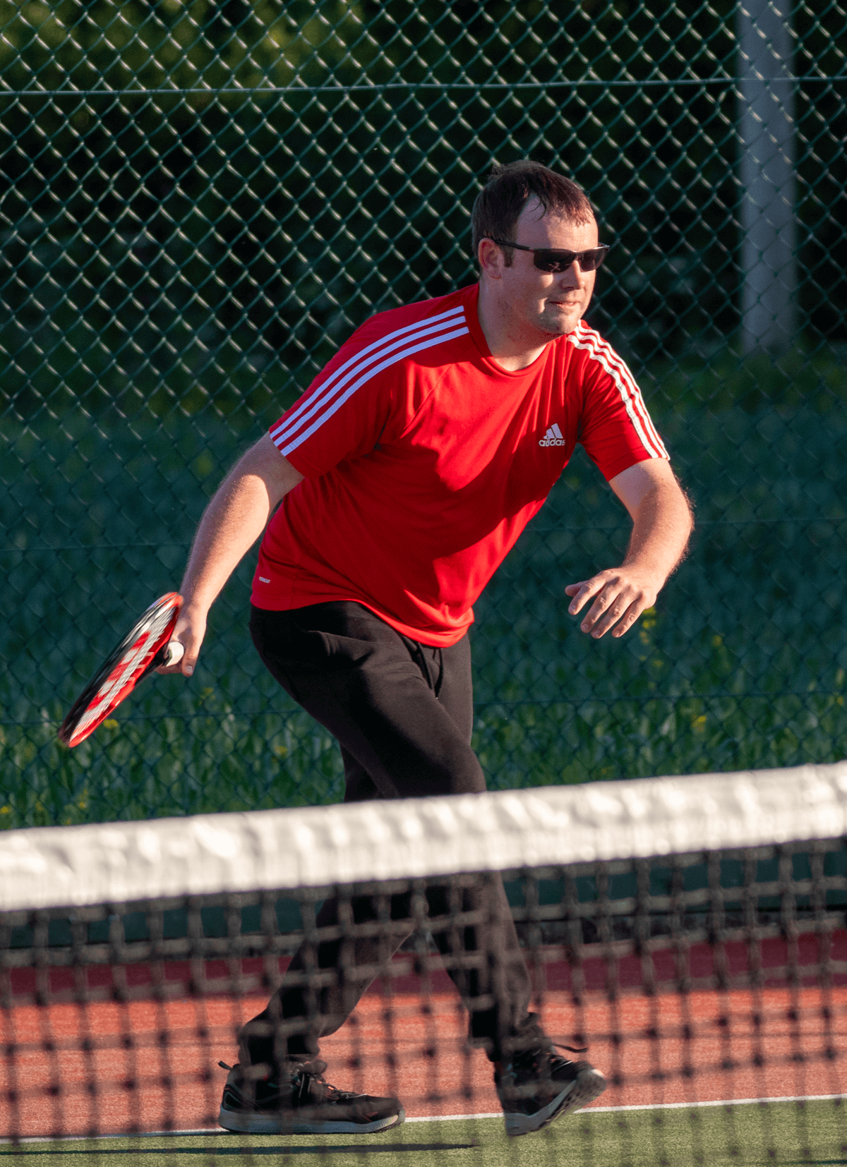 Man playing tennis at Celbridge