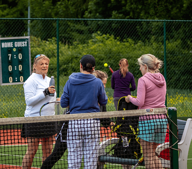 Tennis players chatting at Celbridge Tennis Club